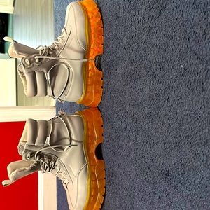 Wore once at a fashion week event in NYC, they are chunky grey boots